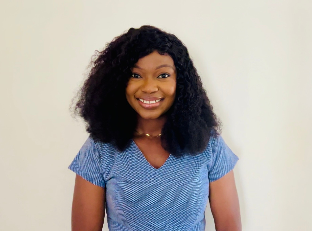 A testimonial photo of a client who found happiness and confidence with the help of a relationship coach.