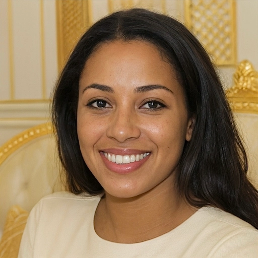 Client smiling, pointing to a review on her screen. She recommends Aneta Mildiani's e-book as the only way to avoid heartbreak and secure the relationship she deserves.