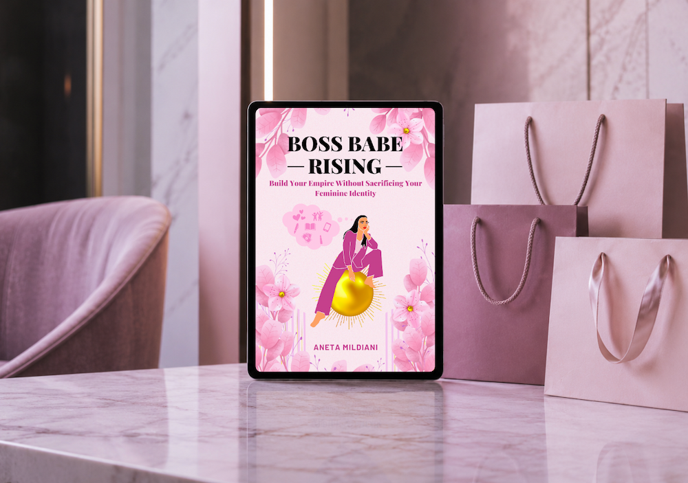 Ebook cover mockup on an exclusive pink background. Title: 'Boss Babe Rising'. Author: Aneta Mildiani. The definitive guide for women seeking serious love and commitment.