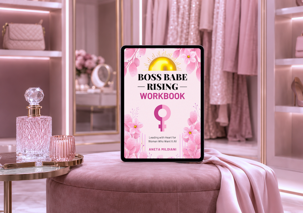 Workbook cover mockup on an exclusive pink background. Title: 'Boss Babe Rising'. Author: Aneta Mildiani. The definitive guide for women seeking serious love and commitment.