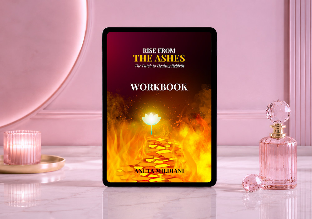 Workbook cover mockup on an exclusive pink background. Title: 'Rise from the Ashes'. Author: Aneta Mildiani. The definitive guide for women seeking serious love and commitment.