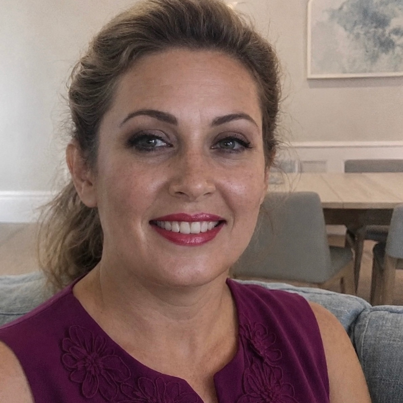 A radiant woman’s testimonial for Aneta Mildiani. Her smile is the visual evidence of a successful transformation in her relationship with the aid of the e-book.